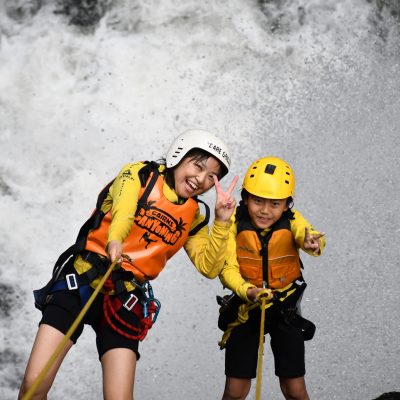 Kids having fun cairns waterfalls at Crystal Canyon