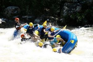 a man riding a motorcycle on a raft in the snow